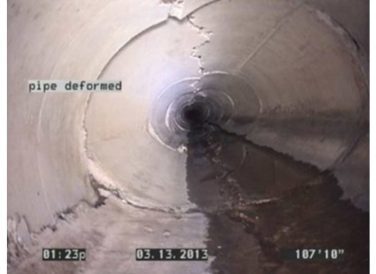 deformed storm drain pipe interior